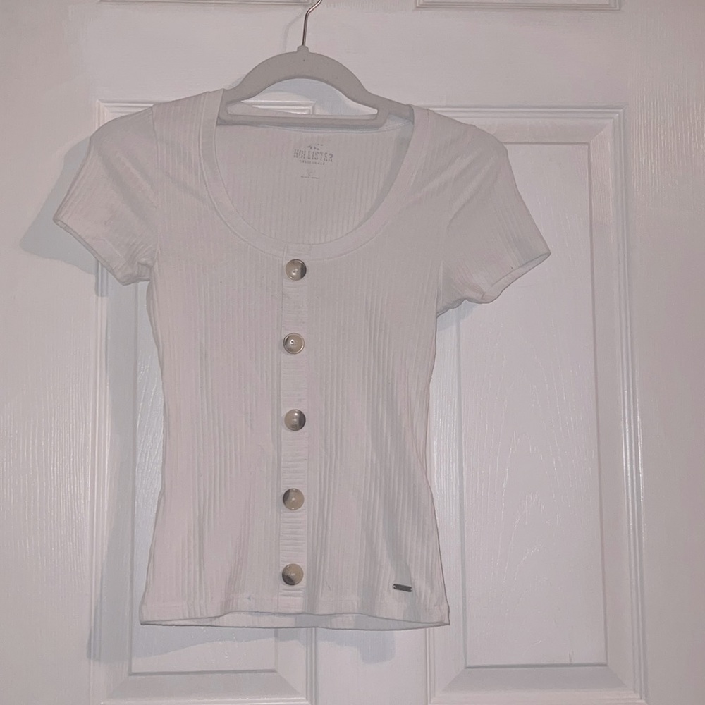 Shirt white with buttons down middle